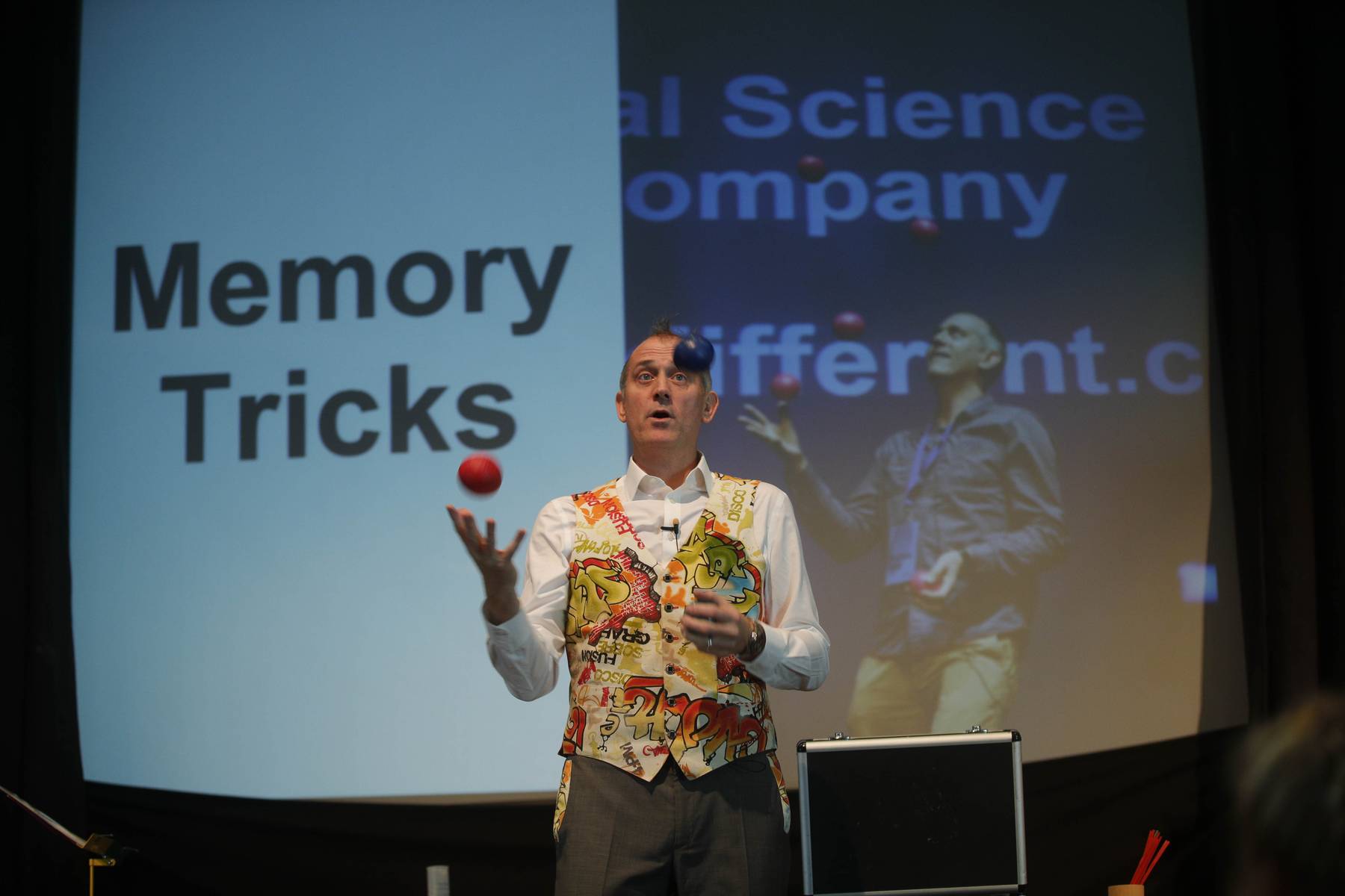 Dr Ken is explaining the maths of juggling and juggling at the same time..