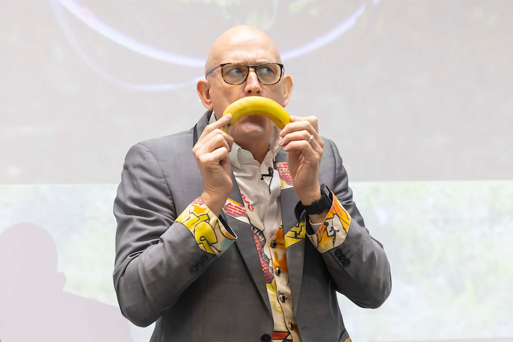 Banana placed over Dr Ken's face in a funny manner